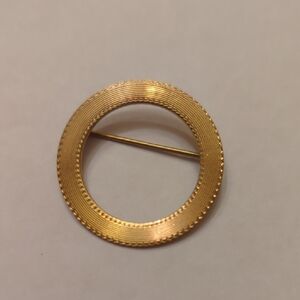 Elegant Gold-Tone Circular Brooch